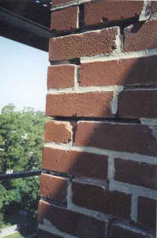 Photograph of crumbling mortar.